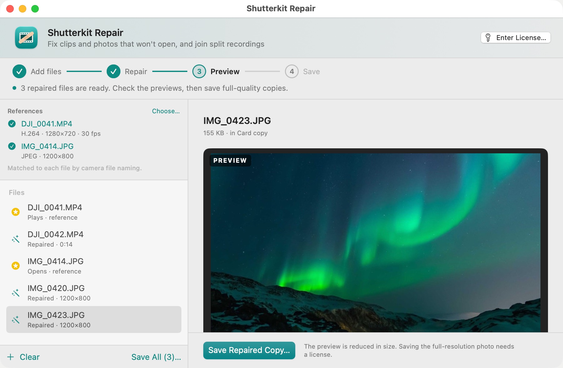 Shutterkit Repair showing a photo of the northern lights rebuilt from a file whose header was wiped, with two drone clips and three photos in the list.